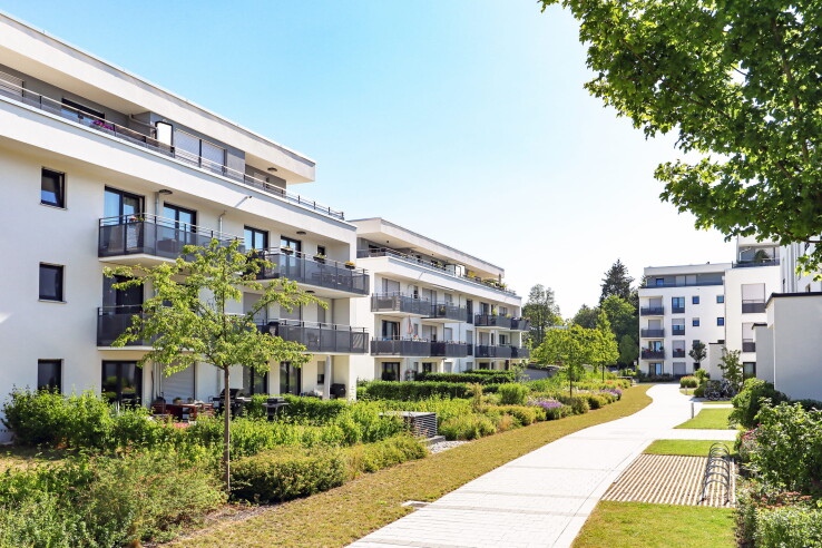Un complexe résidentiel moderne avec des appartements en copropriété, utilisé comme illustration pour le règlement de copropriété.