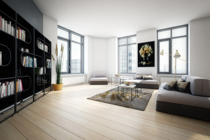 Aménagez un grand salon de façon chaleureuse avec un canapé, un tapis, des sources de lumière et des espaces bien délimités.