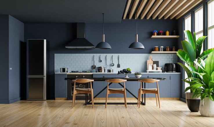 Une cuisine aménagée selon les principes du Feng Shui, avec une disposition harmonieuse de la cuisinière, de l'évier et du réfrigérateur, et des matériaux naturels.