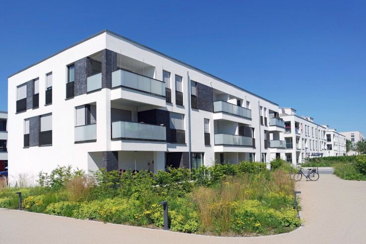 Immeuble collectif comprenant des appartements en location, utilisé à titre d'illustration pour désigner les revenus locatifs immobiliers imposables.